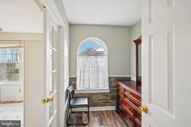 a room with furniture and a window