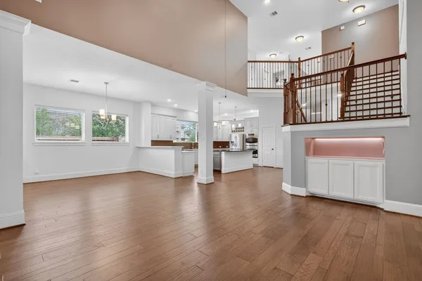 a view of kitchen with furniture and wooden floor