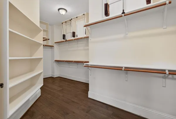 a view of an empty walk in closet