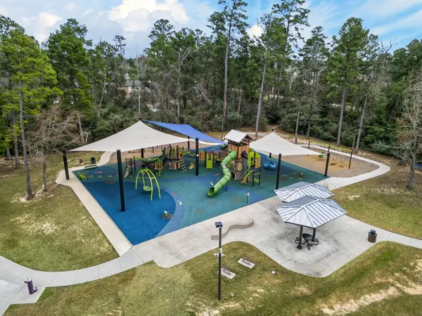 swimming pool with outdoor seating and yard in back