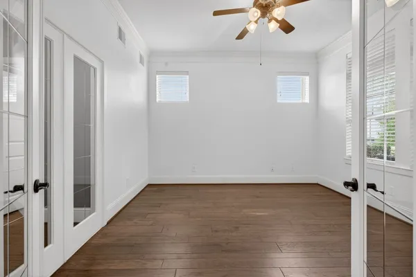 a view of an empty room with a window