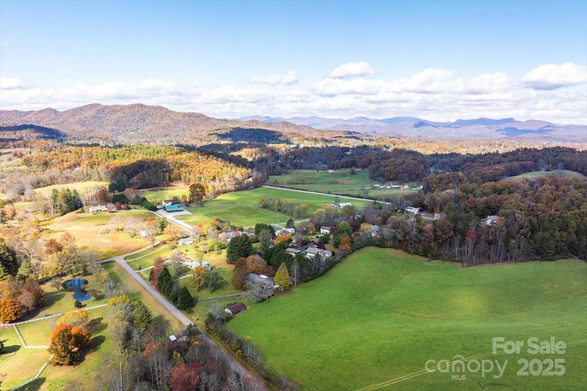 87 Prater Cove Road Franklin, NC 28734 - Photo 9 of 34 a view of a city with mountains in the background