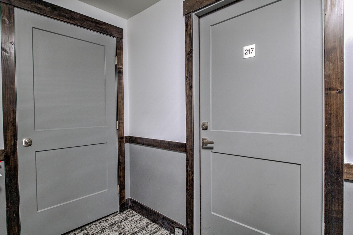 100 Basecamp Way, Unit 217 Frisco, CO 80443 - Photo 29 of 39 a bathroom with a glass shower door