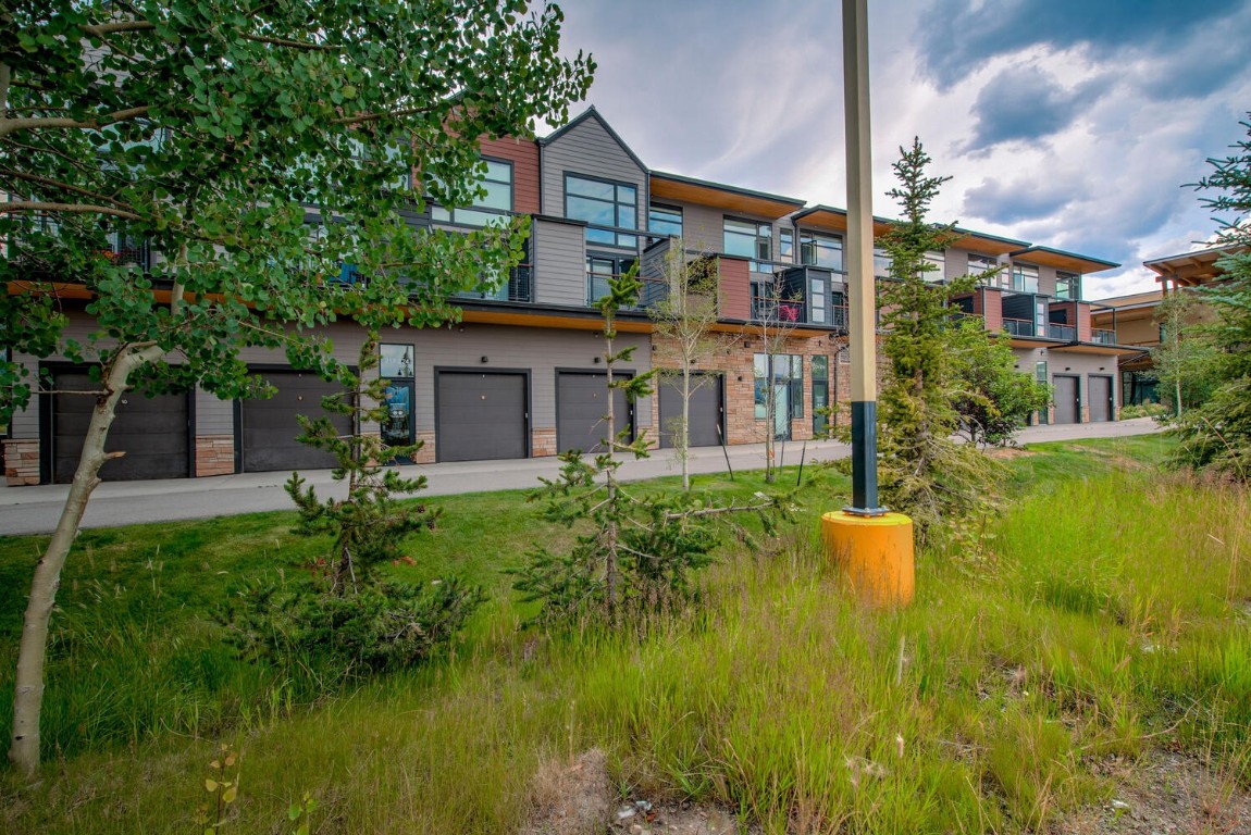 100 Basecamp Way, Unit 217 Frisco, CO 80443 - Photo 32 of 39 a front view of a house with a garden