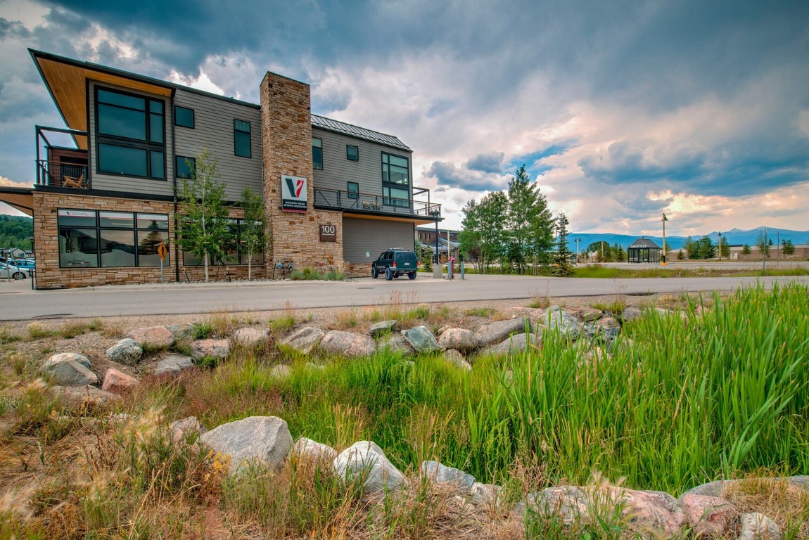 100 Basecamp Way, Unit 217 Frisco, CO 80443 - Photo 38 of 39 a swimming pool with outdoor seating and yard