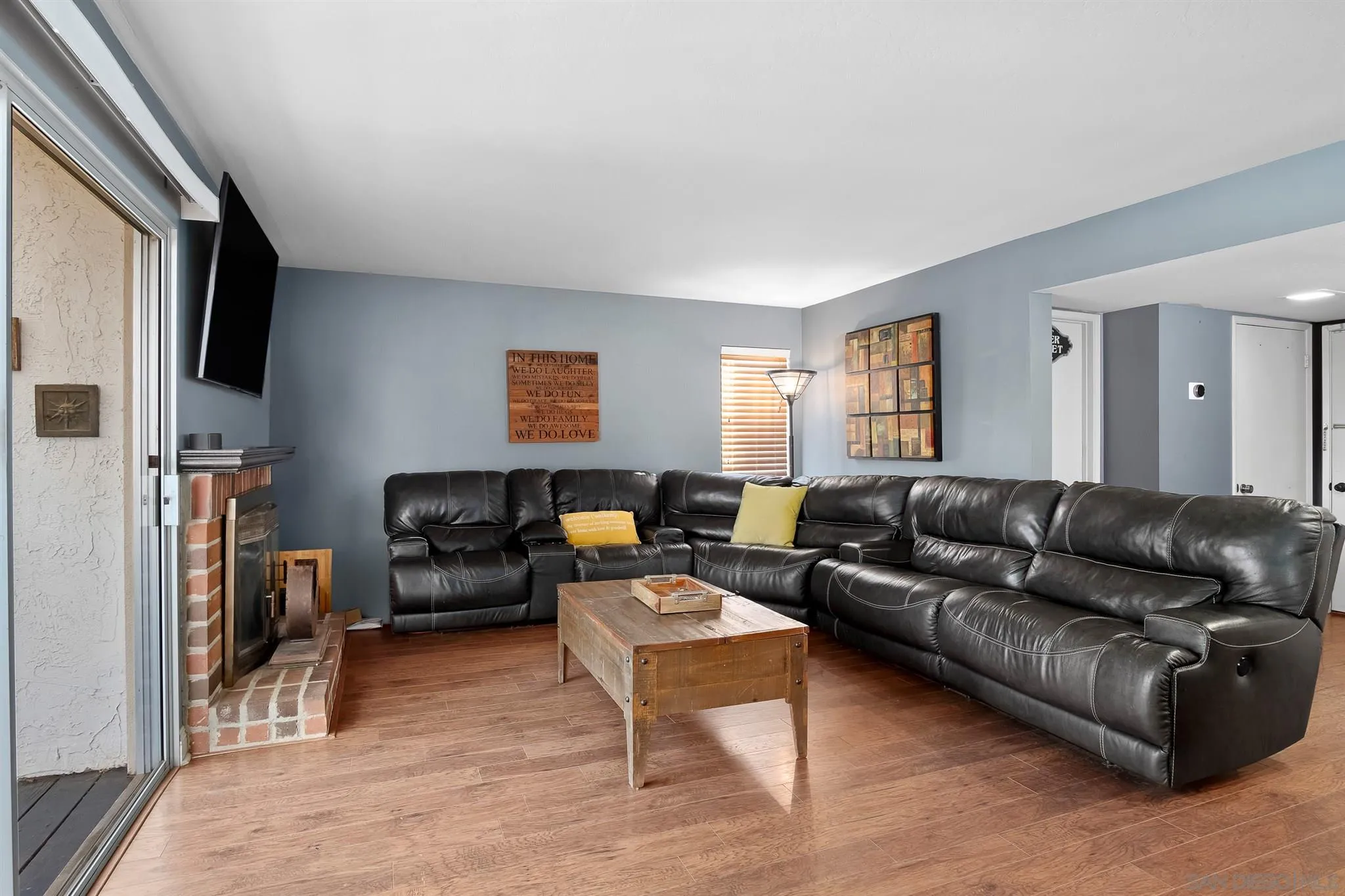 330 Rock Ridge Place Escondido, CA 92027 - Photo 11 of 32 a living room with furniture fireplace and a window