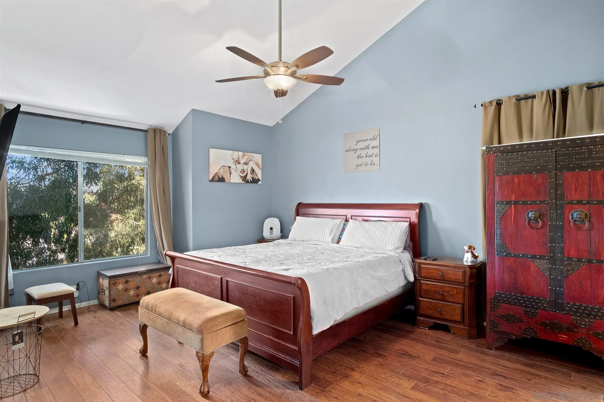 330 Rock Ridge Place Escondido, CA 92027 - Photo 14 of 32 a bedroom with a bed a table and a large window