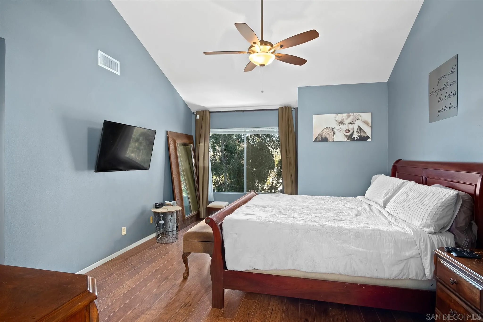 330 Rock Ridge Place Escondido, CA 92027 - Photo 15 of 32 a bedroom with a bed and a flat screen tv