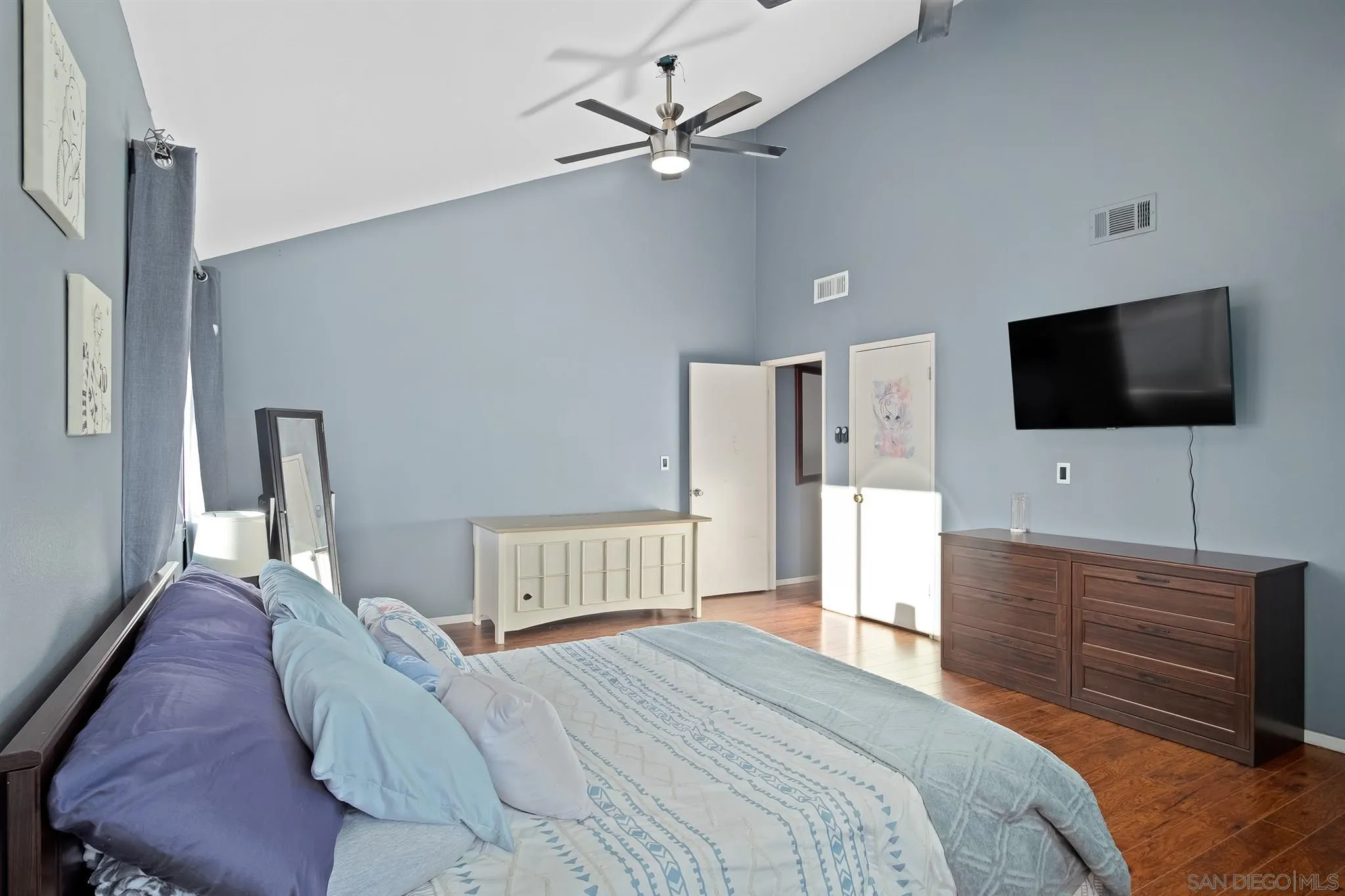330 Rock Ridge Place Escondido, CA 92027 - Photo 22 of 32 a bedroom with a bed and a flat screen tv
