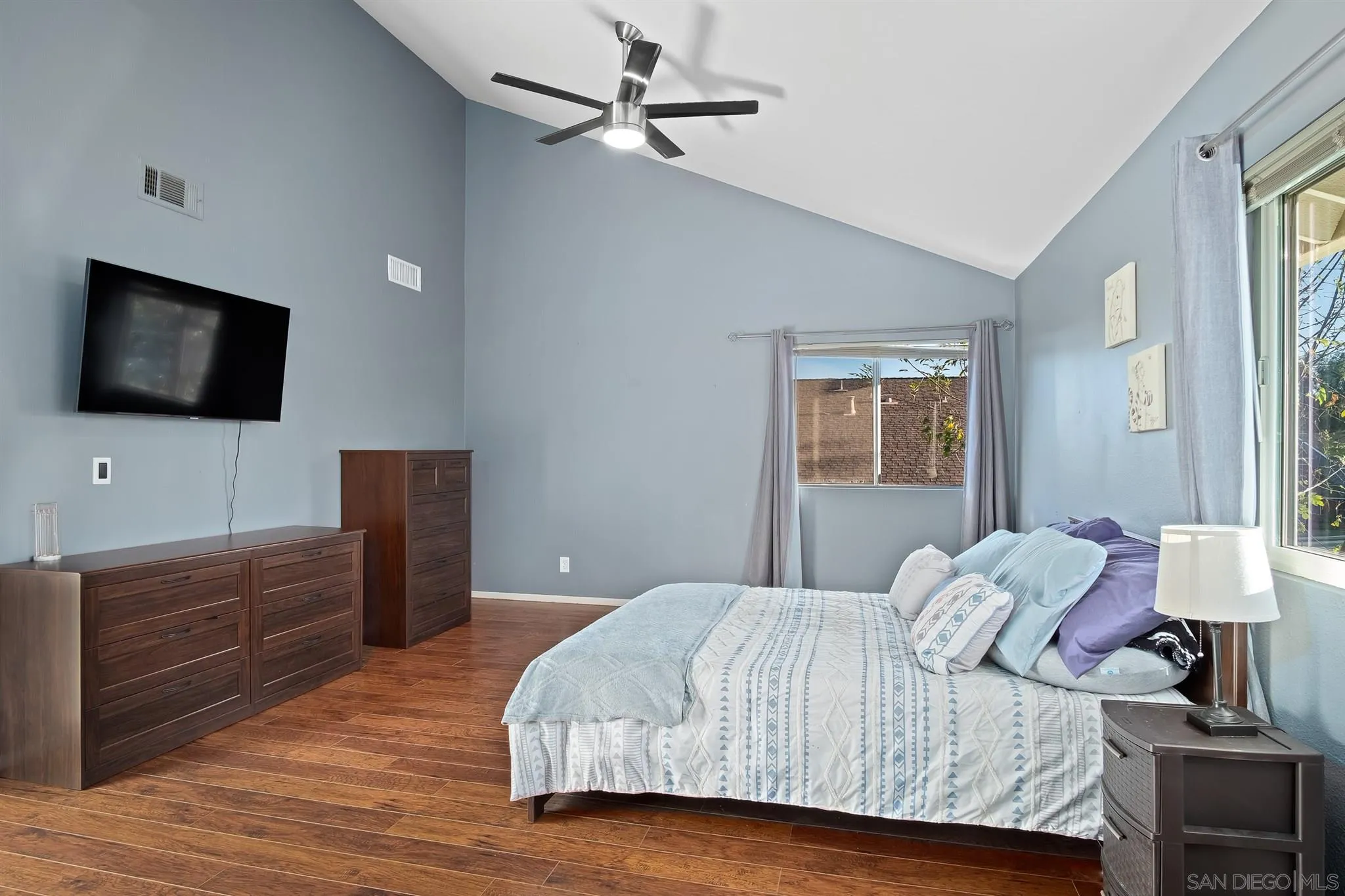 330 Rock Ridge Place Escondido, CA 92027 - Photo 23 of 32 a bedroom with a bed and a flat screen tv