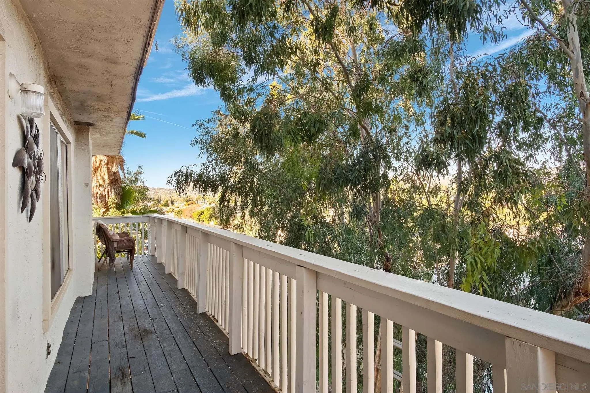 330 Rock Ridge Place Escondido, CA 92027 - Photo 24 of 32 a view of a balcony with wooden floor