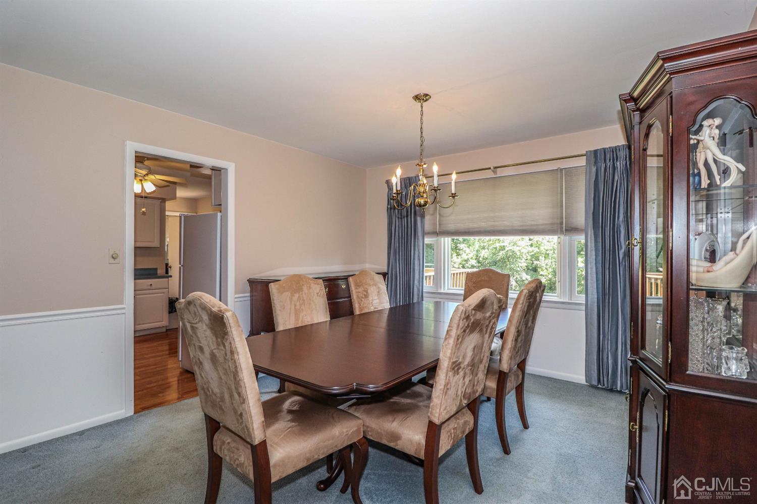 434 Hoffman Station Road Monroe Township, NJ 08831 - Photo 11 of 36 a view of a dining room with furniture window and outside view