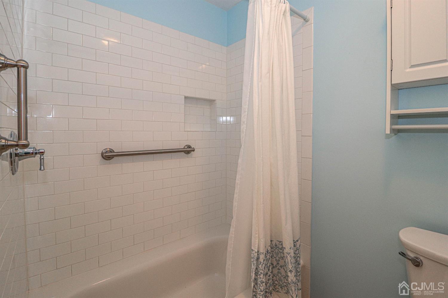 434 Hoffman Station Road Monroe Township, NJ 08831 - Photo 20 of 36 a bathroom with a shower and a toilet