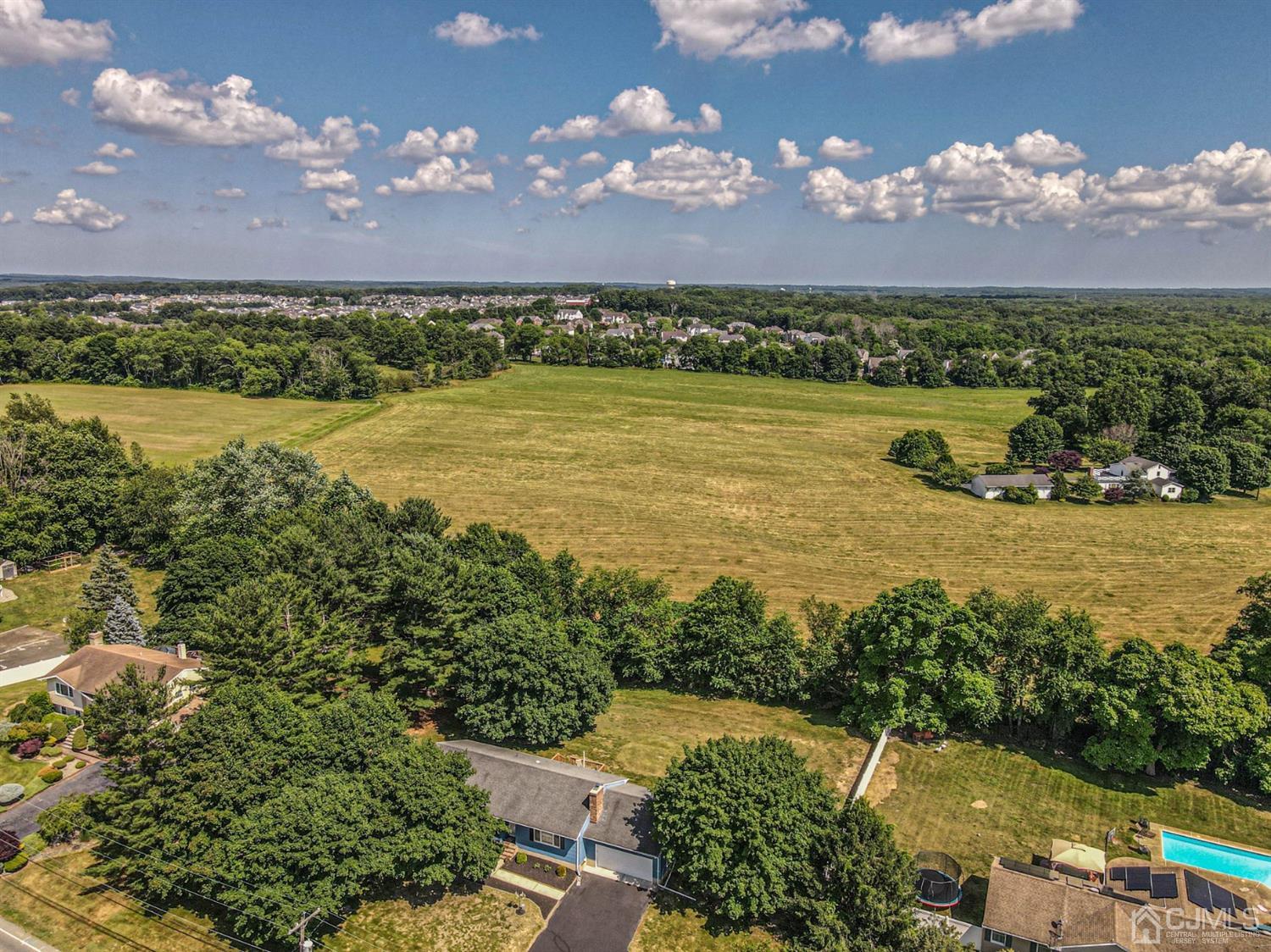 434 Hoffman Station Road Monroe Township, NJ 08831 - Photo 34 of 36 an aerial view of a houses with a lake view