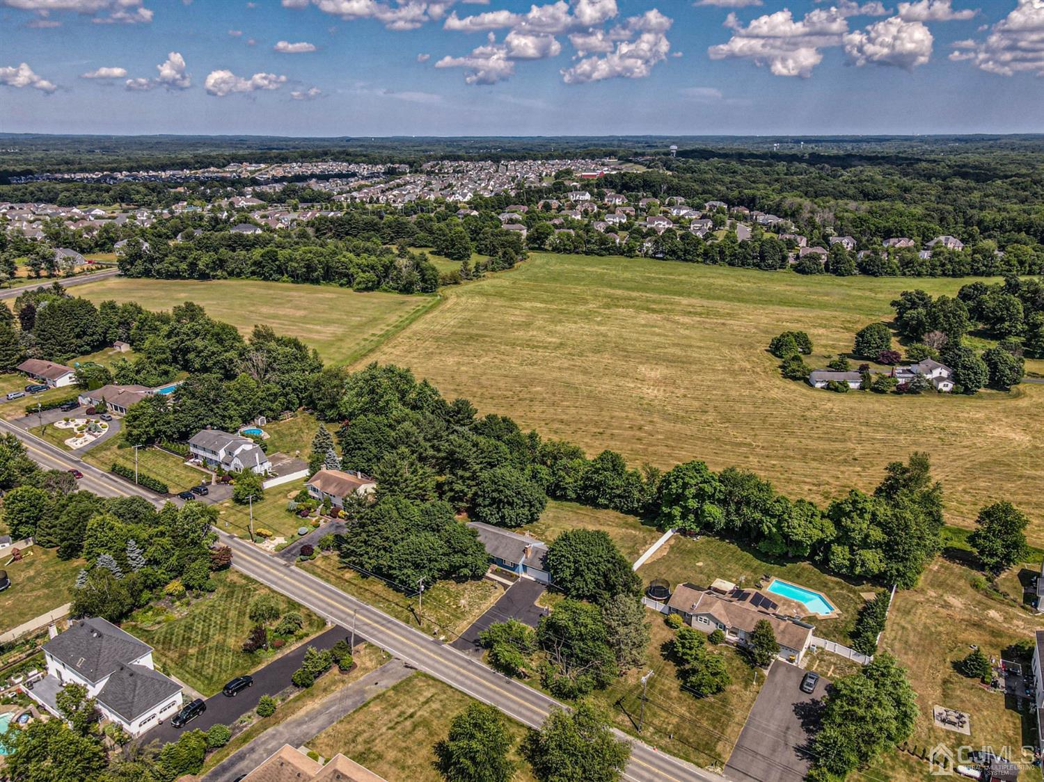 434 Hoffman Station Road Monroe Township, NJ 08831 - Photo 35 of 36 an aerial view of ocean and residential houses with outdoor space