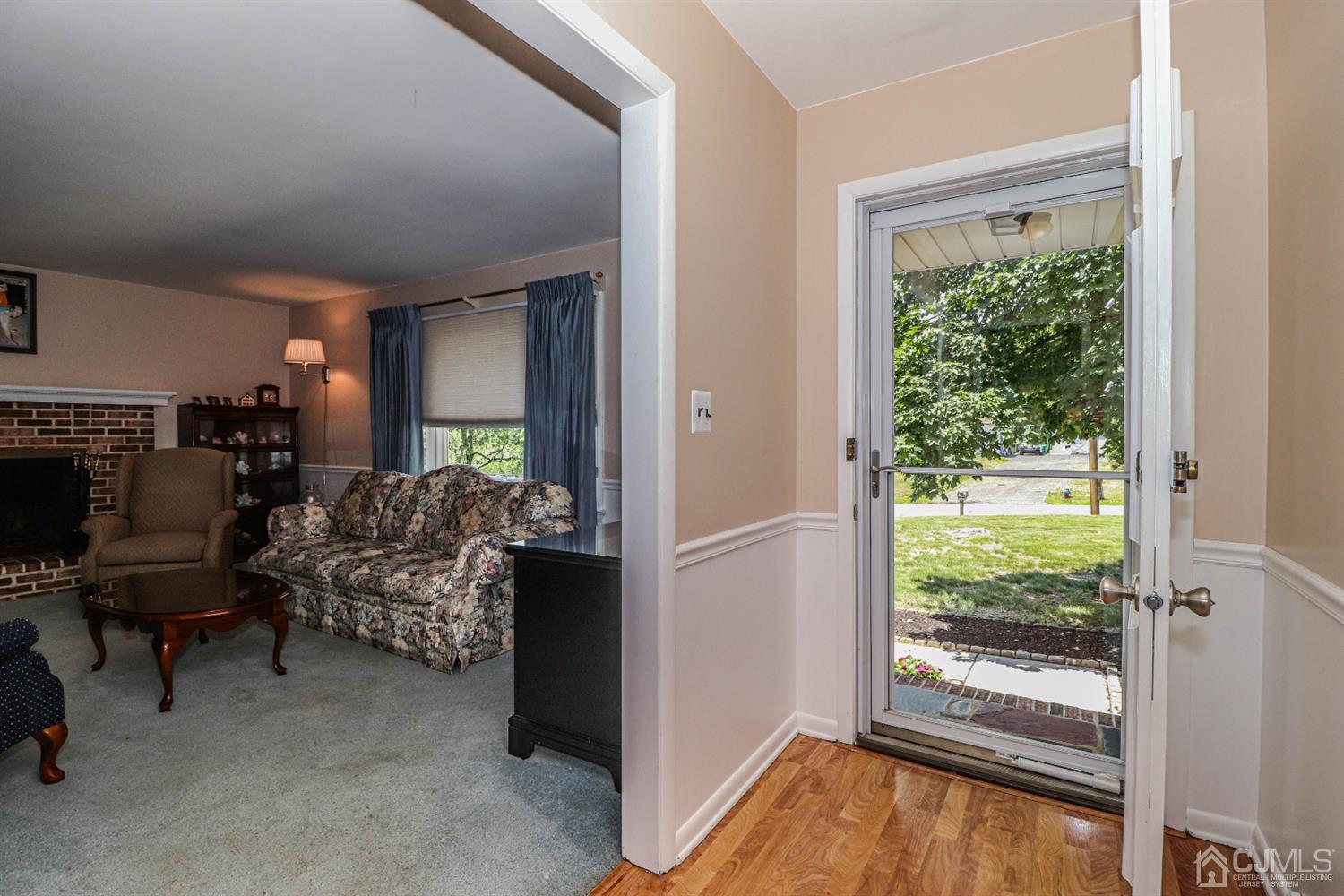 434 Hoffman Station Road Monroe Township, NJ 08831 - Photo 6 of 36 a living room with furniture and a large window