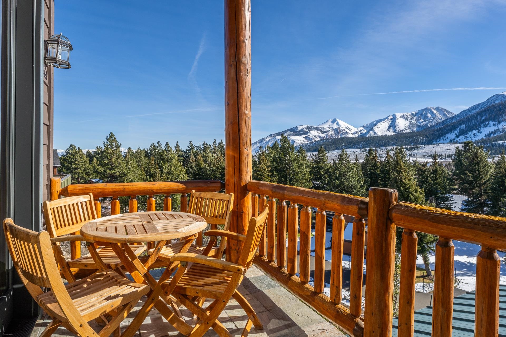 91 Ridge Way Mammoth Lakes, CA 93546 - Photo 13 of 49 a view of a chairs and table on the balcony