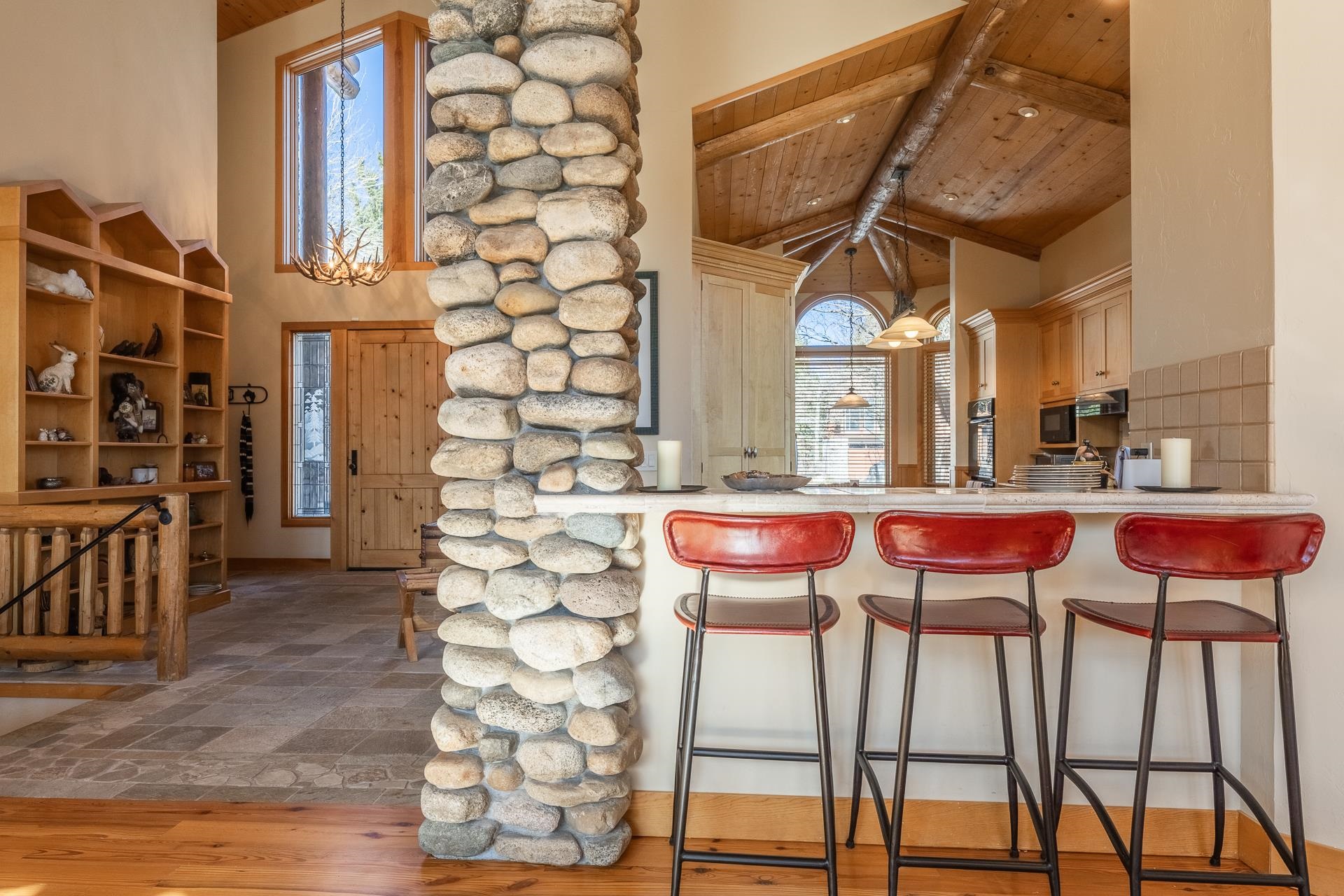 91 Ridge Way Mammoth Lakes, CA 93546 - Photo 14 of 49 a dining room with furniture and a chandelier
