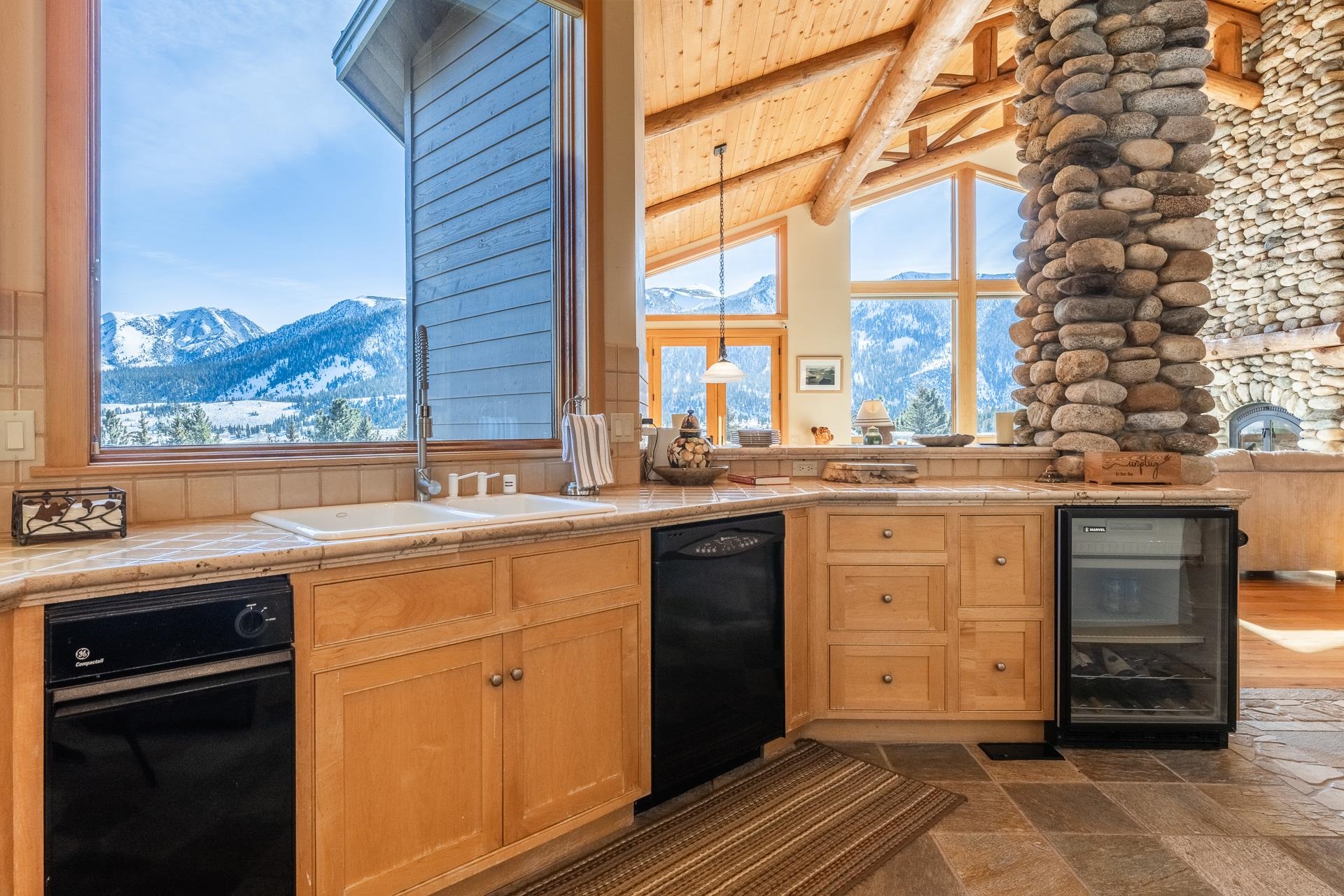 91 Ridge Way Mammoth Lakes, CA 93546 - Photo 15 of 49 a kitchen with a sink and cabinets