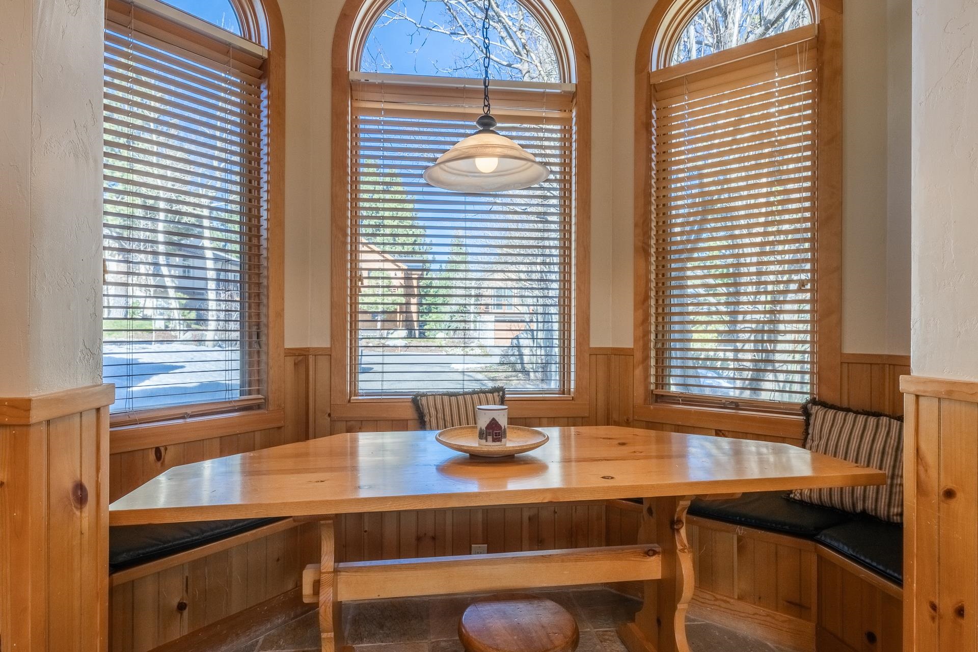 91 Ridge Way Mammoth Lakes, CA 93546 - Photo 17 of 49 a room with a table chairs and a window