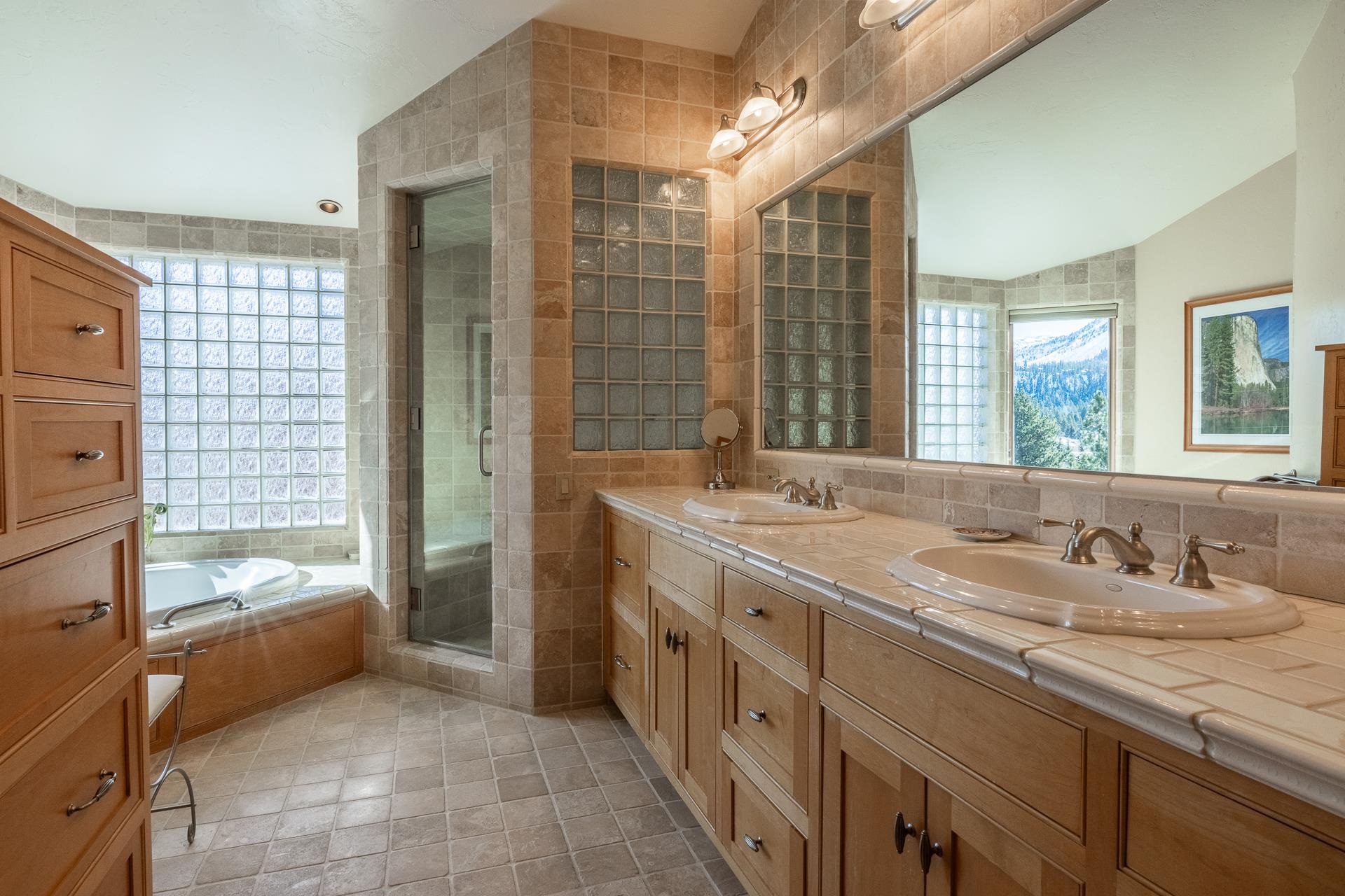 91 Ridge Way Mammoth Lakes, CA 93546 - Photo 22 of 49 a bathroom with a tub sink and mirror