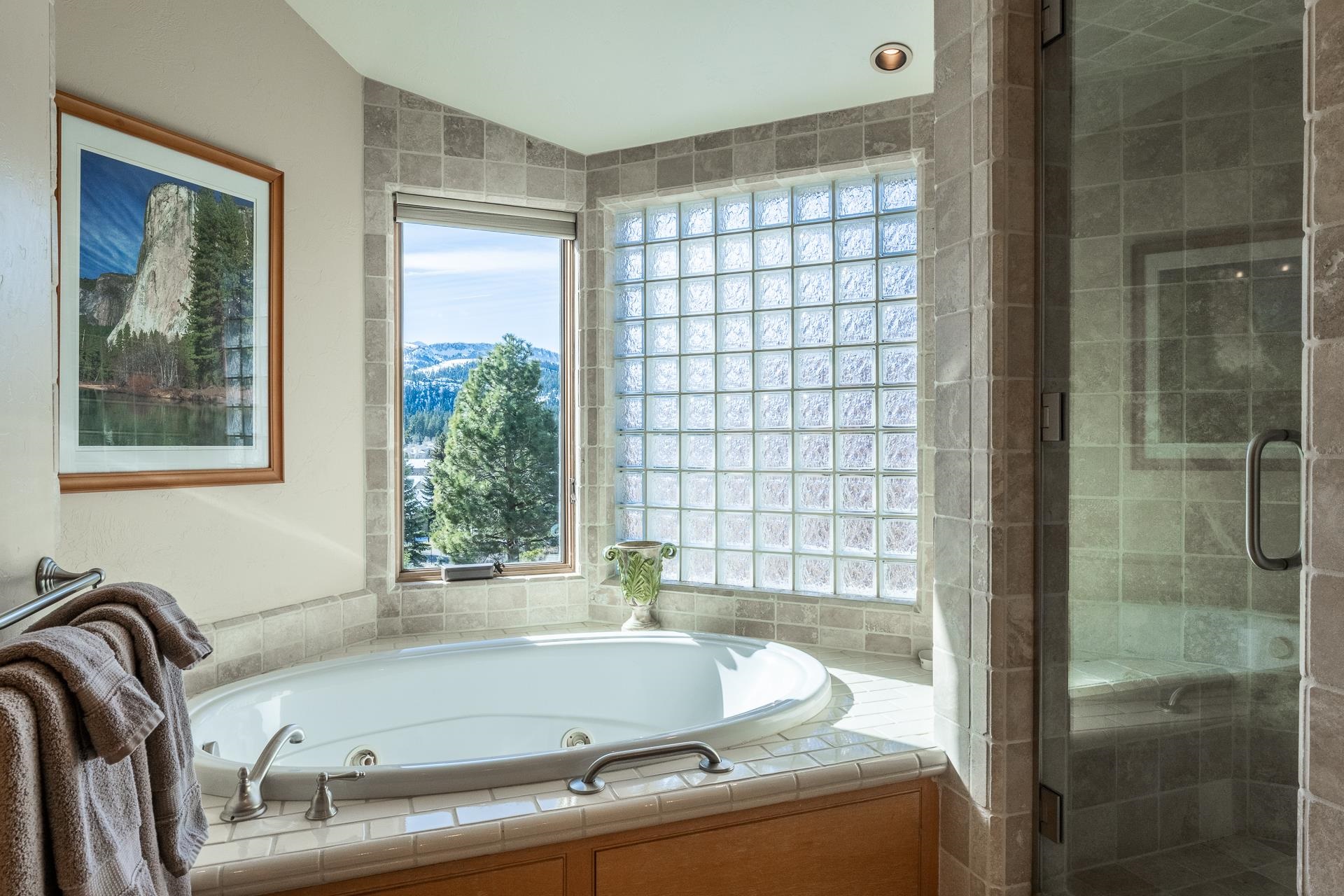 91 Ridge Way Mammoth Lakes, CA 93546 - Photo 23 of 49 a bath tub sitting next to a window