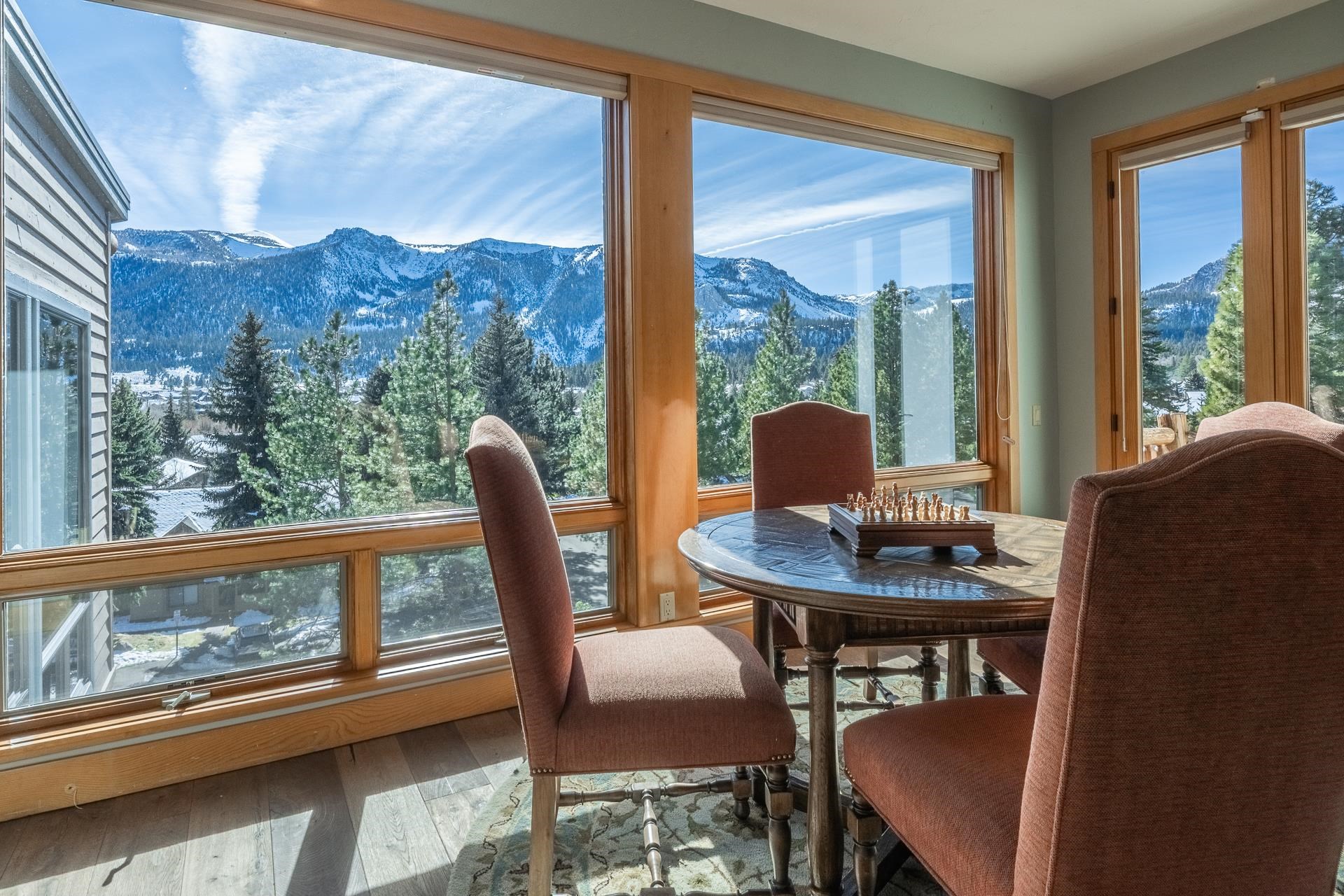 91 Ridge Way Mammoth Lakes, CA 93546 - Photo 25 of 49 a view of a dining room with furniture and a window