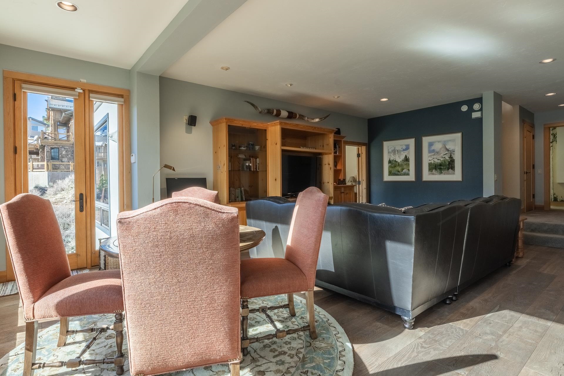 91 Ridge Way Mammoth Lakes, CA 93546 - Photo 27 of 49 a living room with furniture and large windows