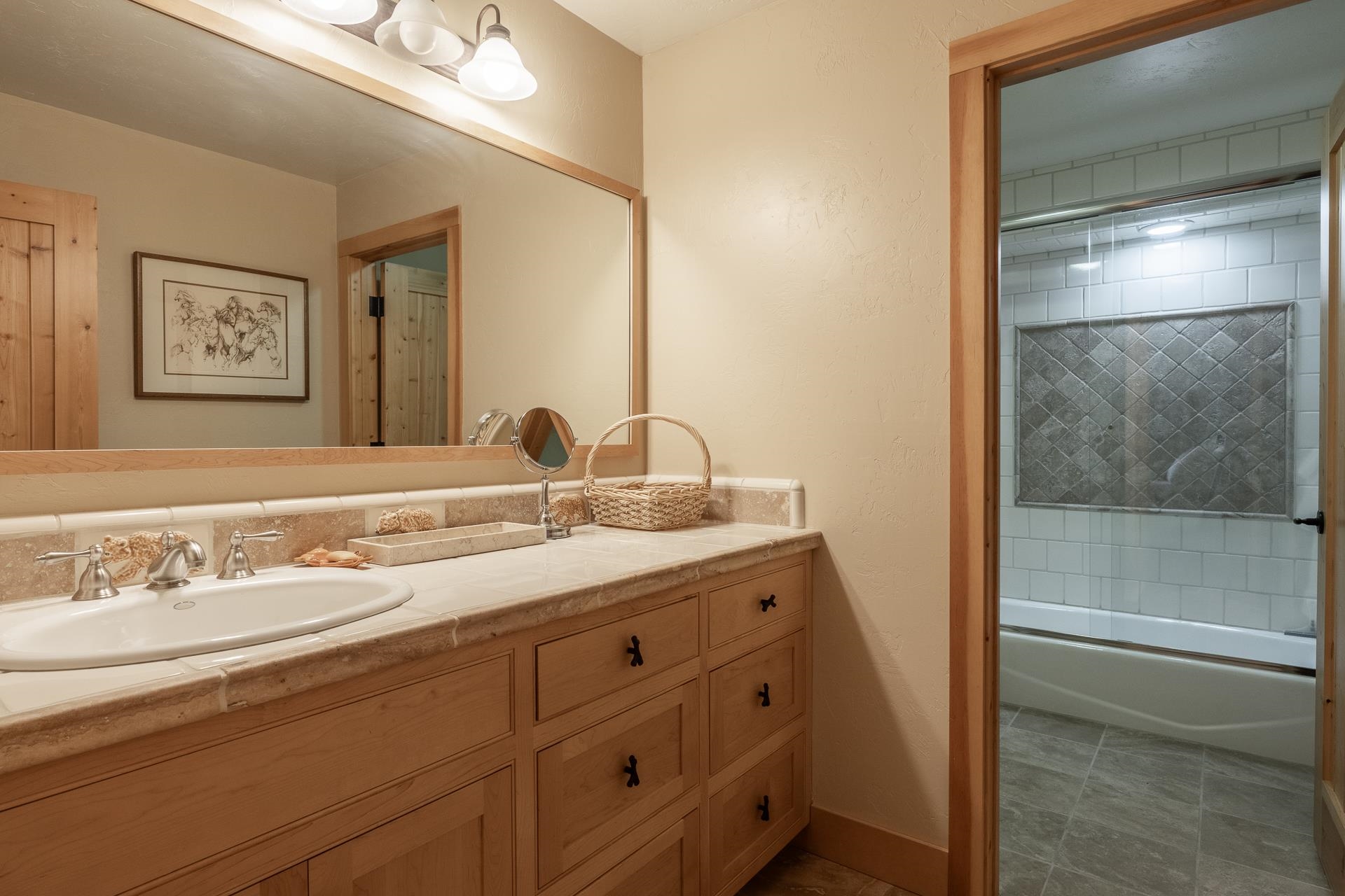91 Ridge Way Mammoth Lakes, CA 93546 - Photo 33 of 49 a bathroom with a double vanity sink and a mirror
