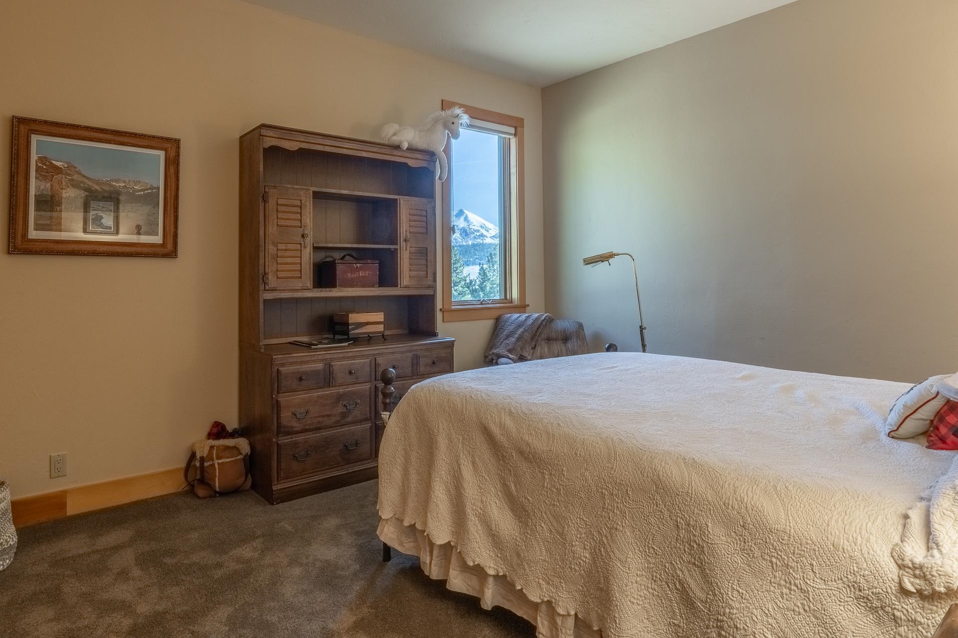 91 Ridge Way Mammoth Lakes, CA 93546 - Photo 39 of 49 a bedroom with a bed and a television