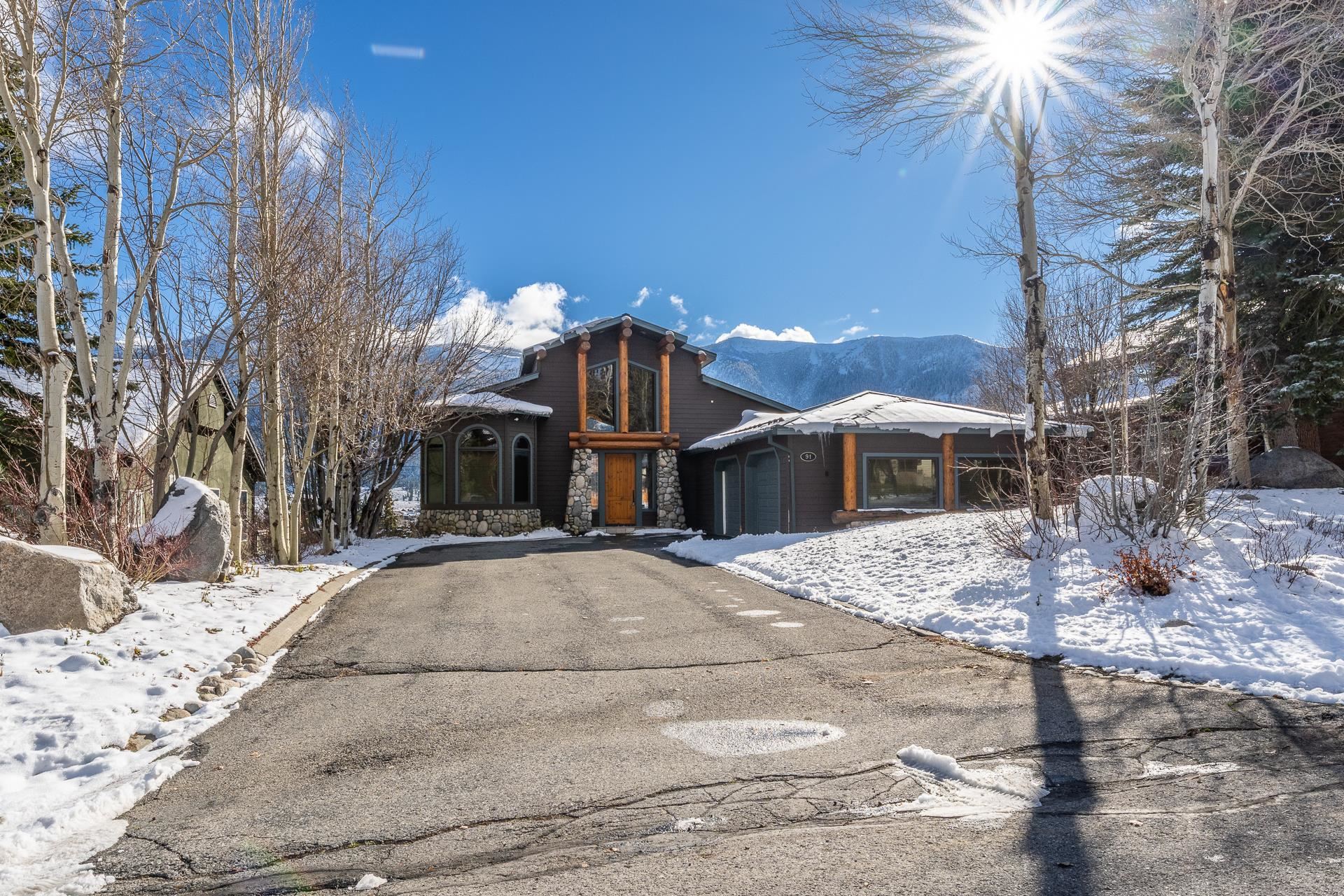 91 Ridge Way Mammoth Lakes, CA 93546 - Photo 46 of 49 a view of a house with a yard