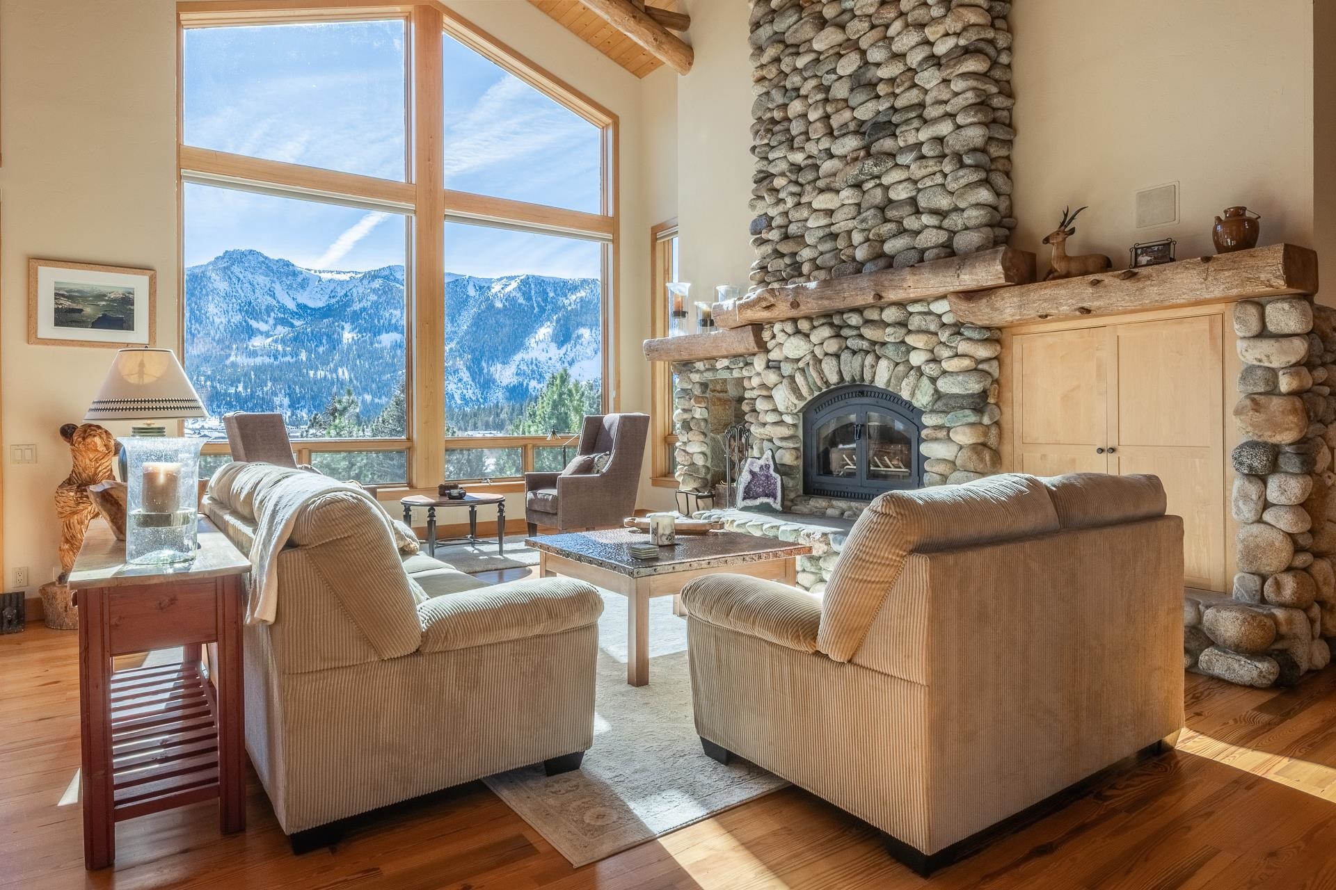91 Ridge Way Mammoth Lakes, CA 93546 - Photo 6 of 49 a living room with furniture and a fireplace