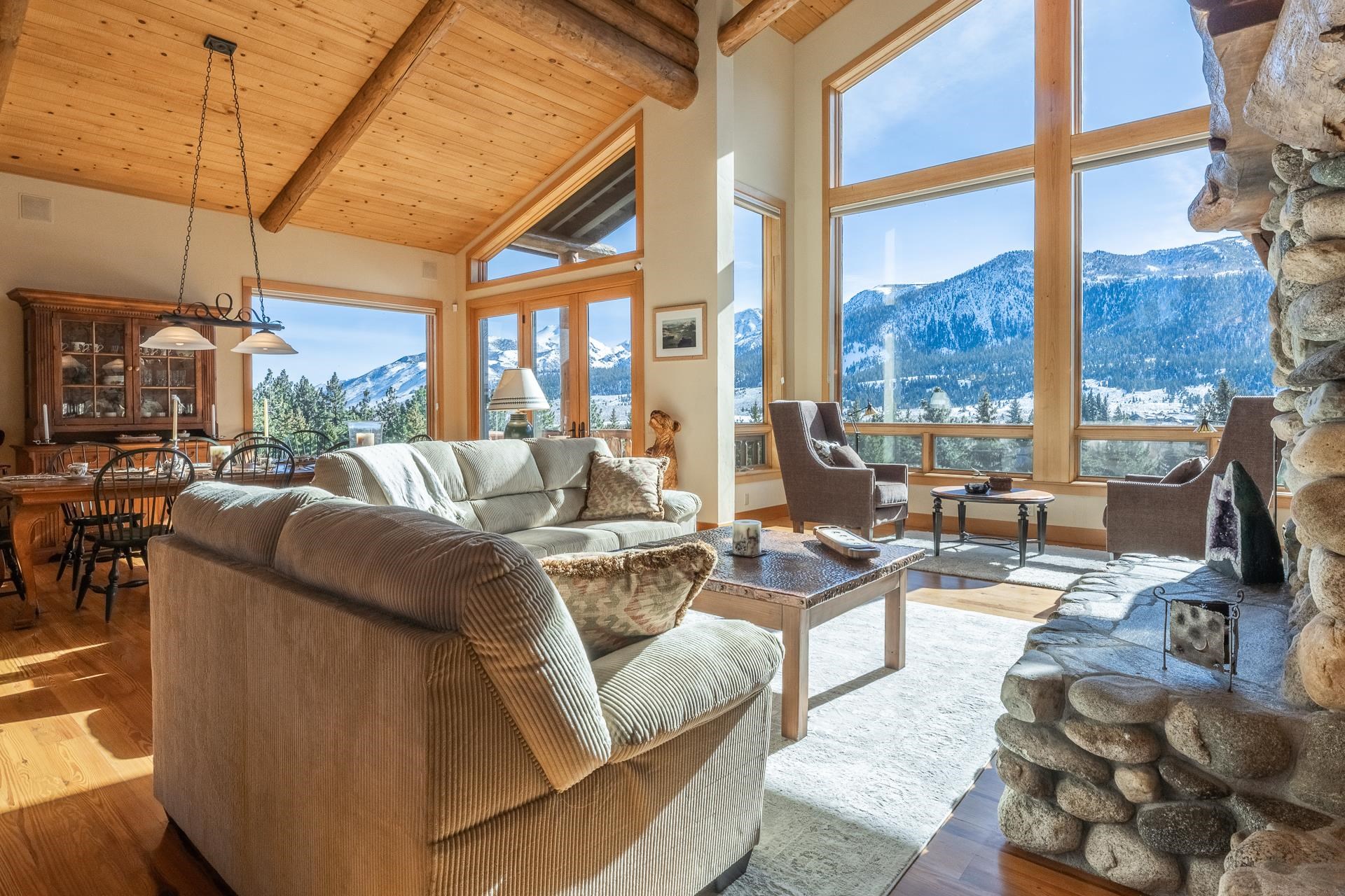 91 Ridge Way Mammoth Lakes, CA 93546 - Photo 8 of 49 a living room with furniture and a floor to ceiling window