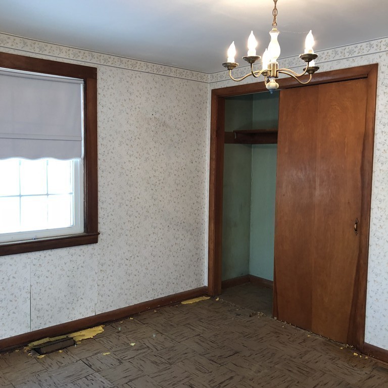 20 Lackey Dam Road Sutton, MA 01590 - Photo 11 of 20 a view of a livingroom with a chandelier