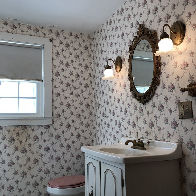 20 Lackey Dam Road Sutton, MA 01590 - Photo 6 of 20 a bathroom with a sink and a mirror