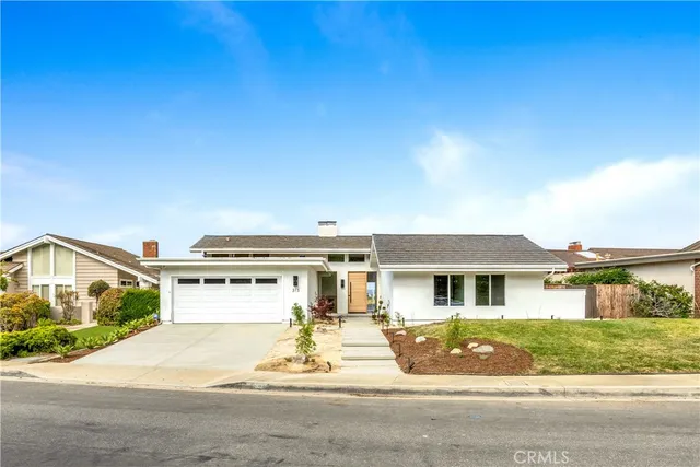 front view of a house with a street