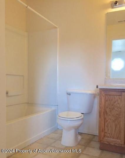 2519 Meadow Circle Rifle, CO 81650 - Photo 8 of 10 a bathroom with a toilet and a bathtub