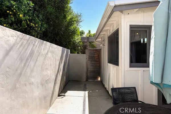 a view of a walk in front of house