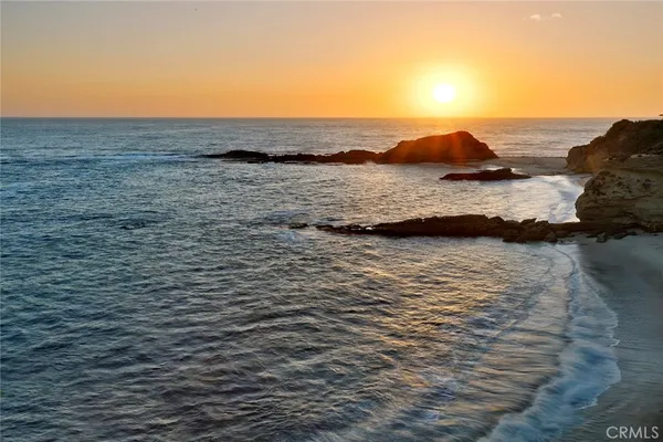 a view of a lake with a yard