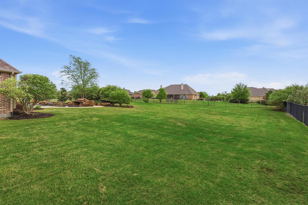 406 Spurgin Road Lucas, TX 75002 - Photo 35 of 39 View of fenced yard