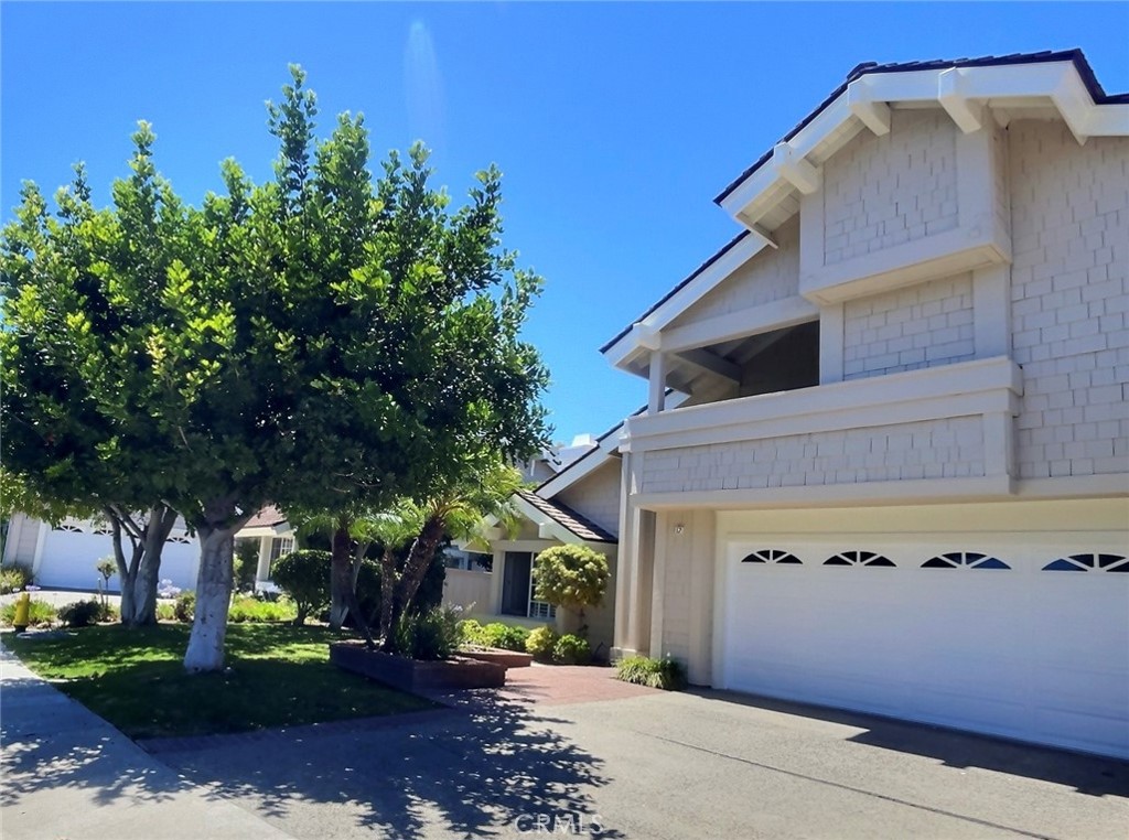 17 Elderberry Irvine, CA 92603 - Photo 1 of 24 a front view of a building with trees