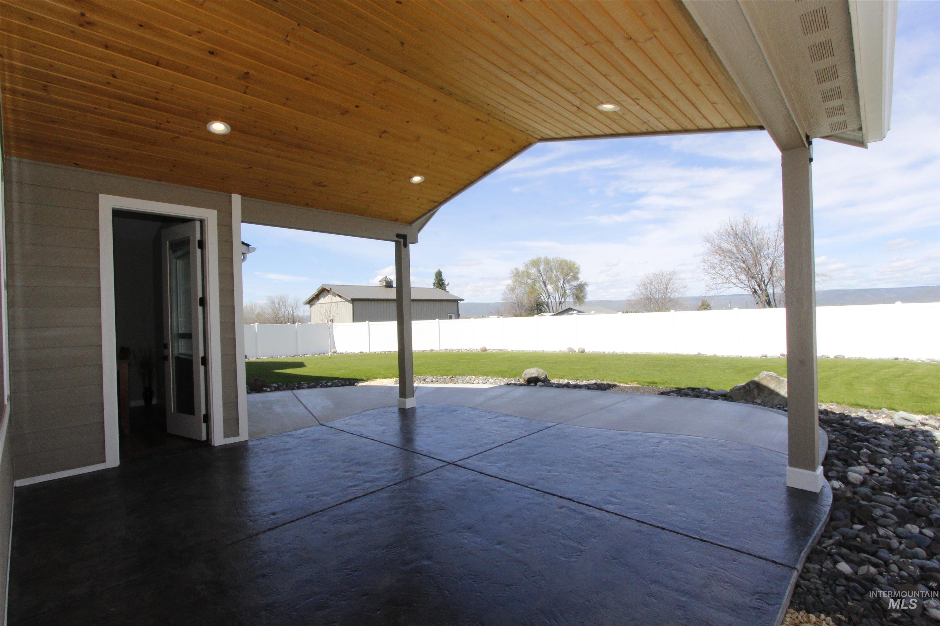 2013 Cedar Avenue Lewiston, ID 83501 - Photo 29 of 46 Fenced backyard with a patio area