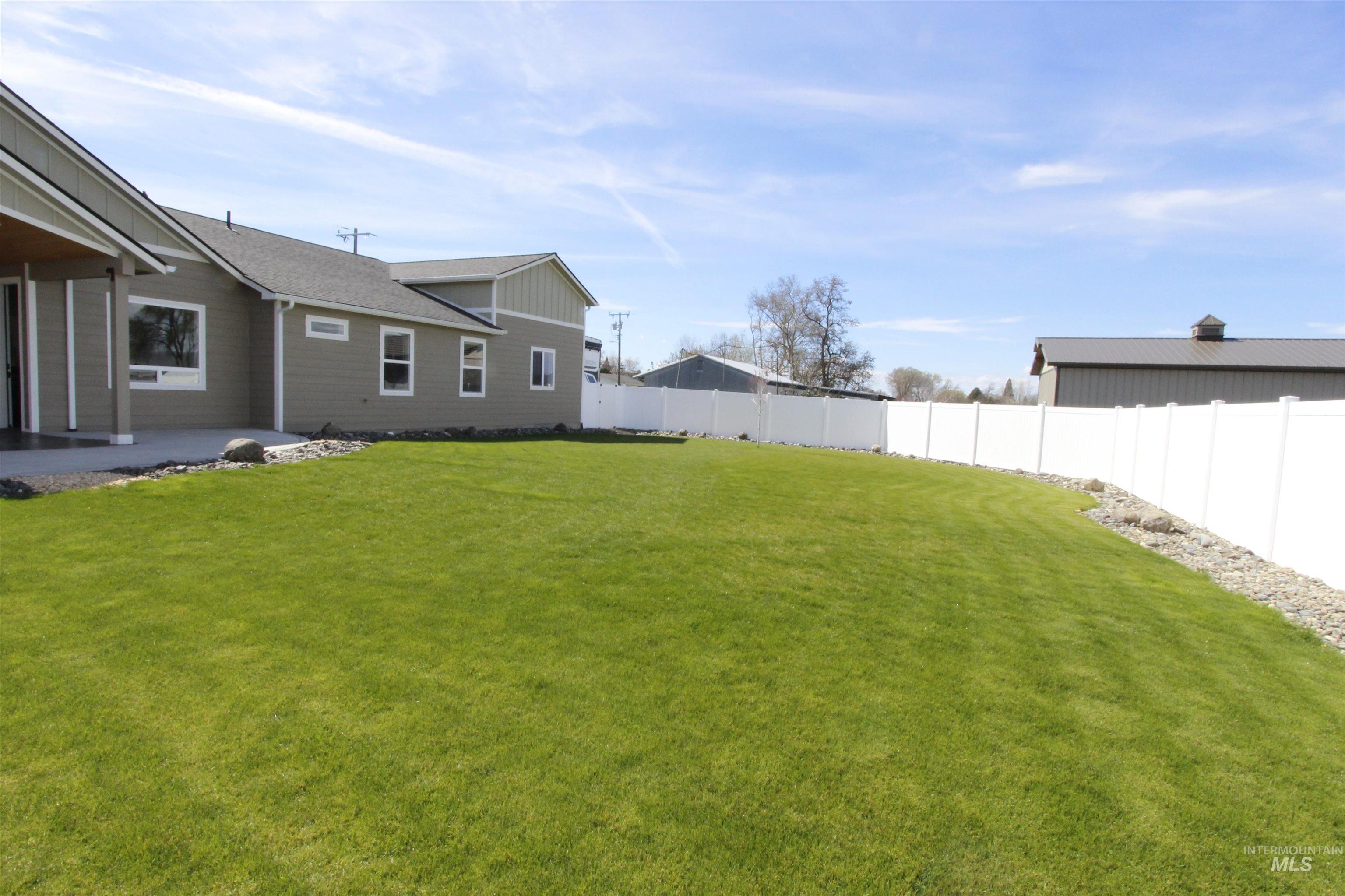 2013 Cedar Avenue Lewiston, ID 83501 - Photo 33 of 46 Fenced backyard with a patio