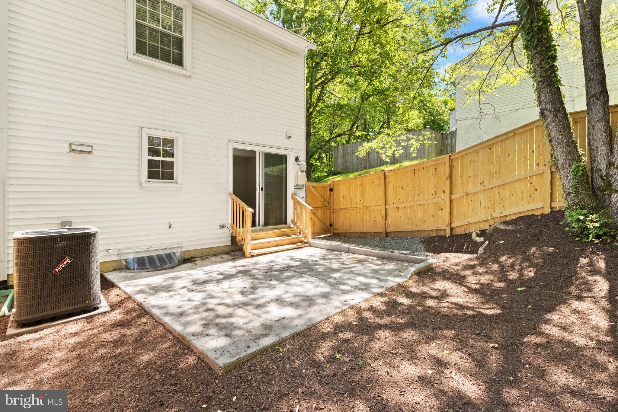 8581 Chester Grove Court Springfield, VA 22153 - Photo 16 of 38 a backyard of a house