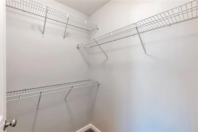 a view of a room with racks on the wall