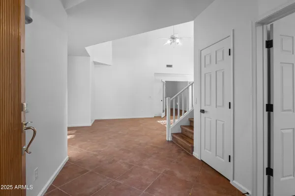 a view of a hallway with staircase