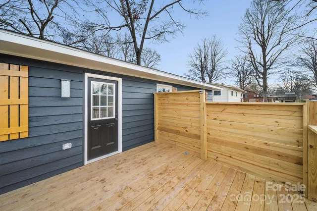 a view of a backyard space