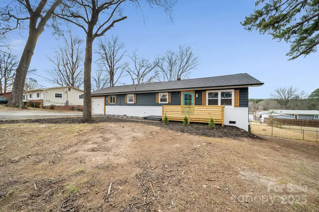 a house view with a backyard space