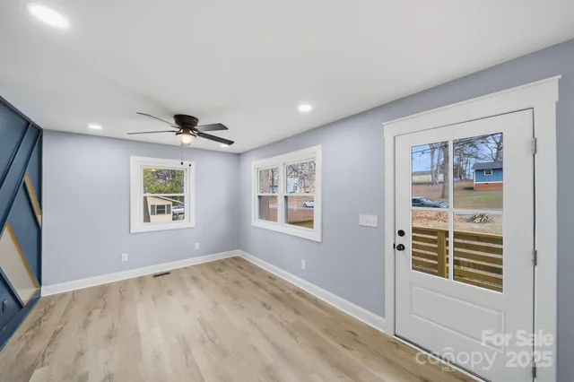 a view of empty room with windows