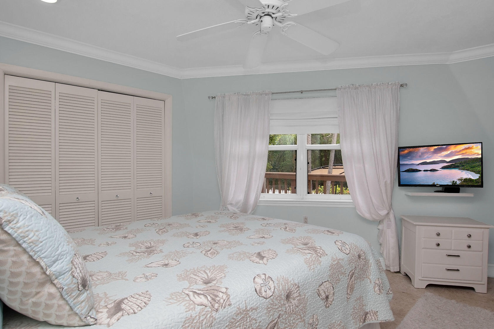 676 Sailfish Trail Key Largo, FL 33037 - Photo 14 of 38 a bedroom with a bed and a flat tv screen